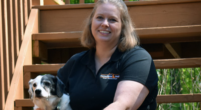 Amy Durfey, owner of Homestead Dogs with her dogs
